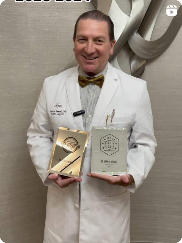 Dr. Newall receiving rewards