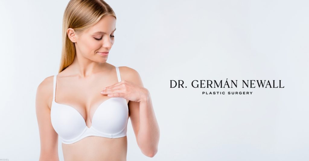 Woman in a white bra representing breast augmentation with silicone or saline breast implants (model)
