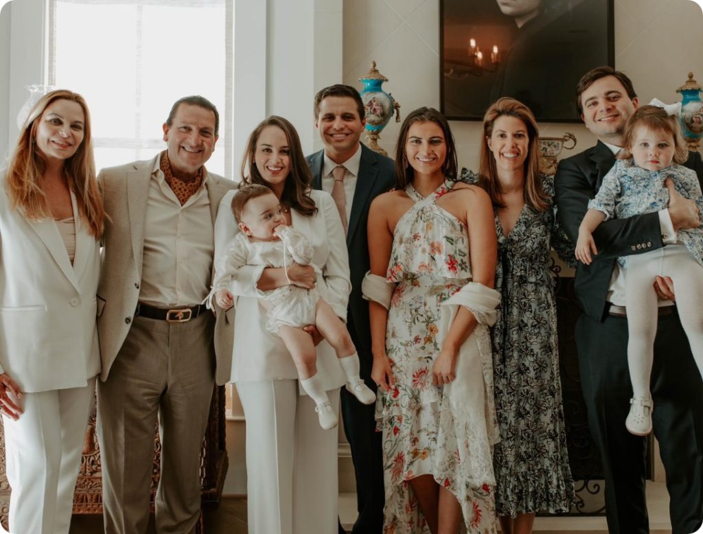 Dr. Newall and his family inside of a nice house