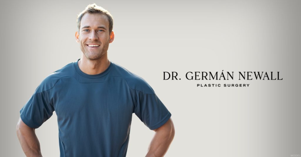 Smiling man showing a slimmer physique, representing liposuction results (model)